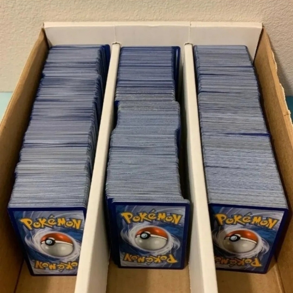 1000 Pokemon cards 75+ rares, 90+ reverse holos